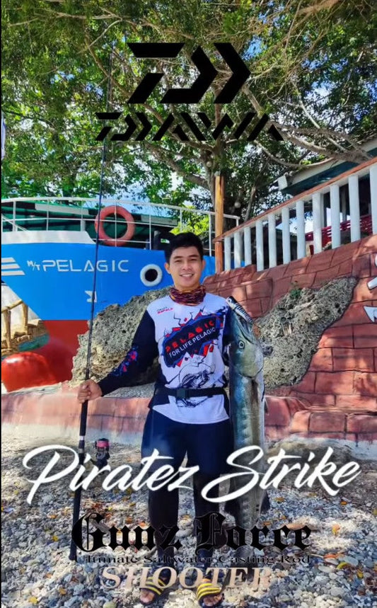 Angler Josh Macnel Sulit testing out the strength of Piratez Stike Gun Force Shooter popping rod as he lands 10kg Giant Barracuda. - Ryoshi Pro Outfitters