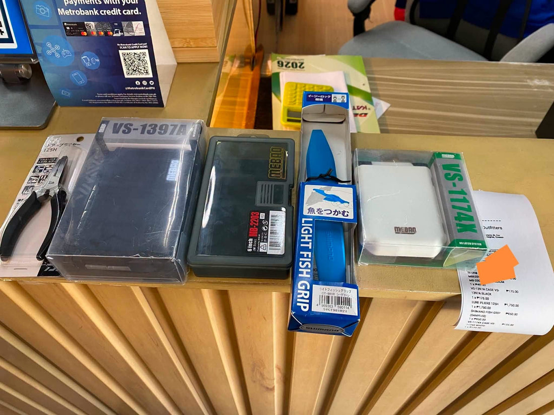 Tools and containers for the clients terminal tackles, mebao containers, daiwa split ring pliers and shimano fish holder. - Ryoshi Pro Outfitters