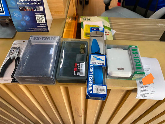 Tools and containers for the clients terminal tackles, mebao containers, daiwa split ring pliers and shimano fish holder. - Ryoshi Pro Outfitters
