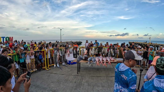 Awarding ceremony held at the port of Banton during the 2nd Banton National Jigging Tournament with tournament organizer Mark Lawrence Forfieda . - Ryoshi Pro Outfitters