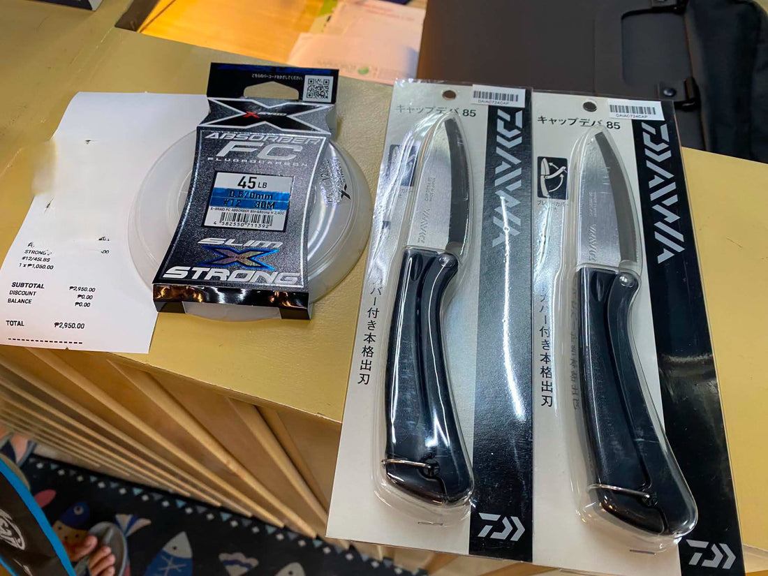 Daiwa Deba knife, a classic japanese fillet knife for fish with cover for easy transport and xbriad ygk fc absorber leader. - Ryoshi Pro Outfitters