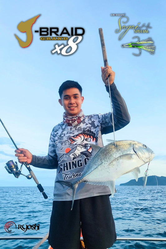 Angler Josh Macnel Sulit landing another GT during one of his light jigging sessions - Ryoshi Pro Outfitters