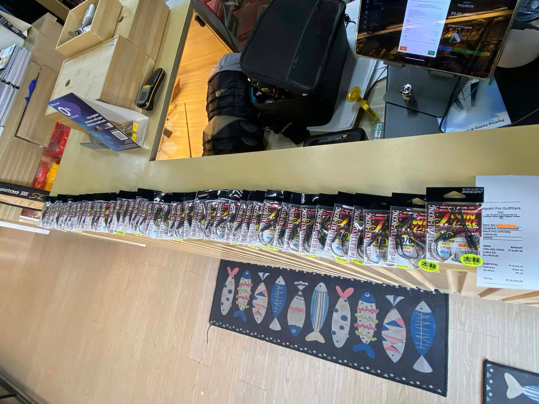 Customer getting ready for another fishing adventure stocking up with Decoy Twin Pike Hyper 4/0. - Ryoshi Pro Outfitters