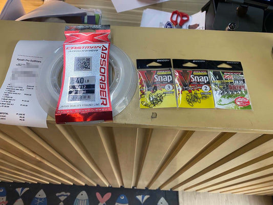 Friday grind, X-braid castman absorber for your casting leader. Also decoy snaps and jigheads for this customers light gaming needs. Thanks for the support sir. - Ryoshi Pro Outfitters